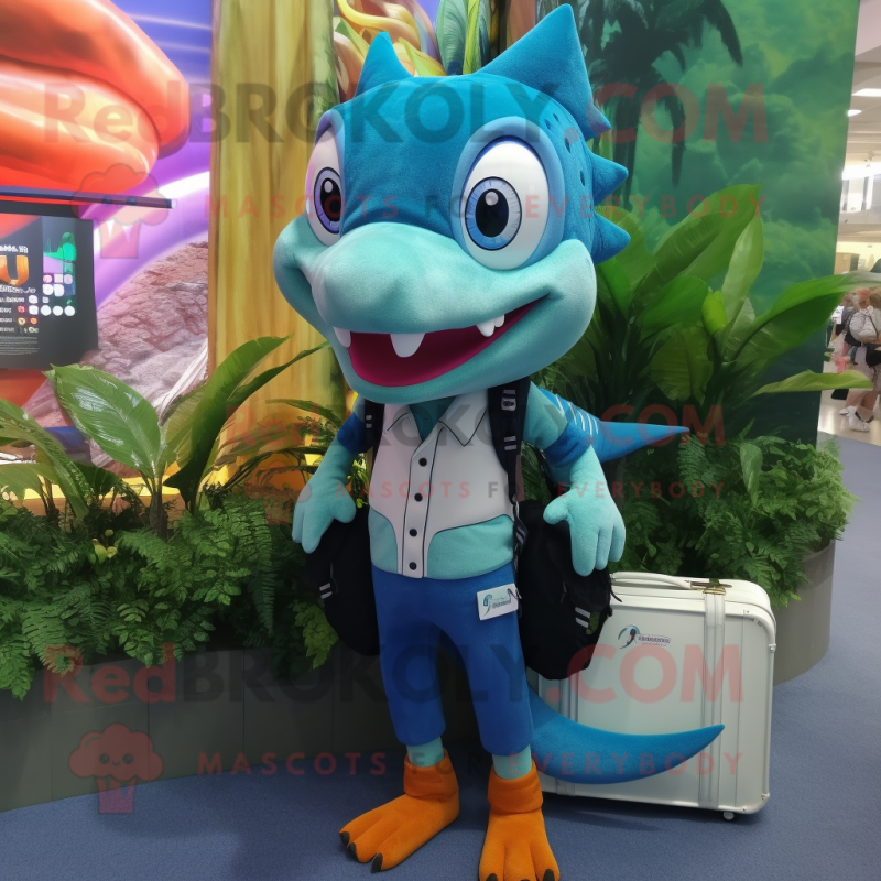 Turquoise Barracuda mascot costume character dressed with a Waistcoat and Messenger bags