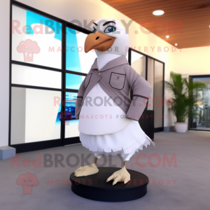 Beige Pigeon mascot costume character dressed with a Dress Pants and Belts