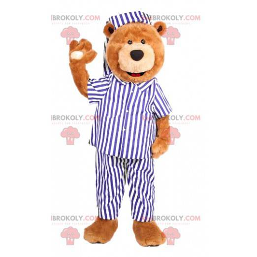 Mascote do urso com pijama listrado de branco e azul -