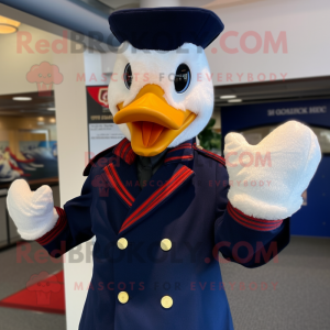 Navy Muscovy Duck mascot costume character dressed with a Blazer and Mittens