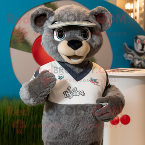 Silver Jaguarundi mascot costume character dressed with a Rugby Shirt and Hat pins