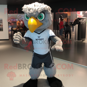 Silver Falcon mascot costume character dressed with a Rugby Shirt and Headbands