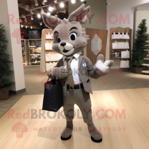 Gray Roe Deer mascot costume character dressed with a Suit Jacket and Tote bags