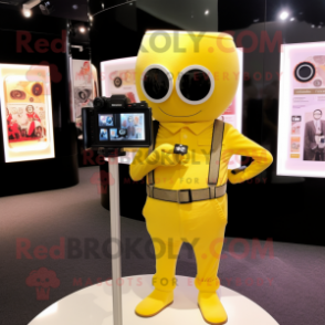 Yellow Camera mascot costume character dressed with a Romper and Ties