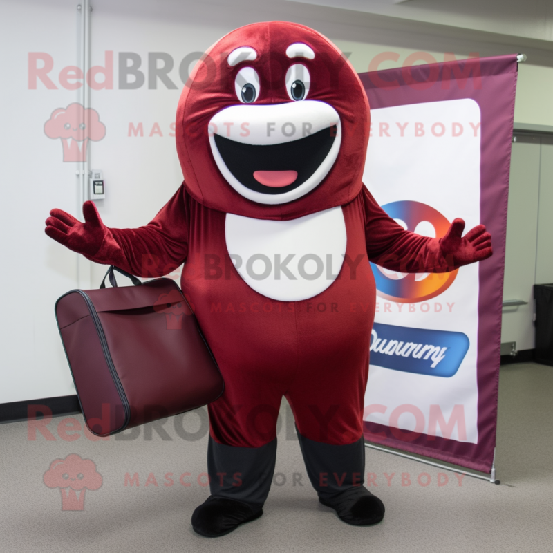 Maroon Donut mascot costume character dressed with a Hoodie and Briefcases Maroon Donut mascot costume character dressed with a Hoodie and Briefcases