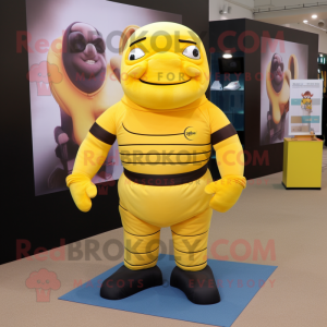 Geel Strongman mascotte...