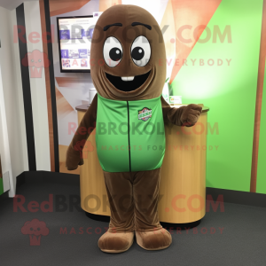 Brown Green Bean mascot costume character dressed with a Hoodie and Tie pins