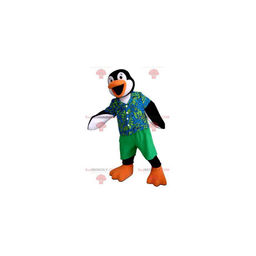 Mascote pinguim preto branco e laranja com uma roupa colorida -