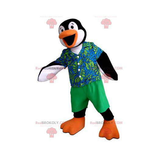 Mascote pinguim preto branco e laranja com uma roupa colorida -