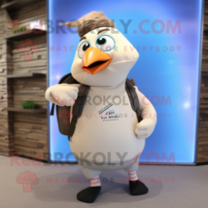 Beige Pigeon mascot costume character dressed with a Yoga Pants and Backpacks