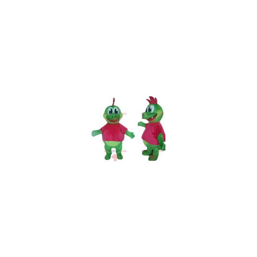 Mascotte dinosauro verde con un grazioso stemma fucsia -