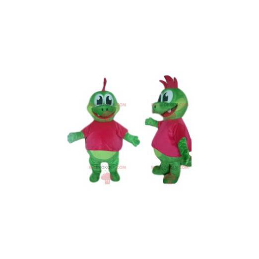 Grön dinosaurie maskot med en vacker fuchsia topp -