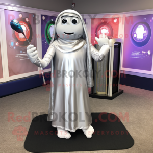 Silver Golf Bag mascot costume character dressed with a Long Sleeve Tee and Shawls