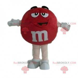 Zeer glimlachende rode M & M'S-mascotte - Redbrokoly.com