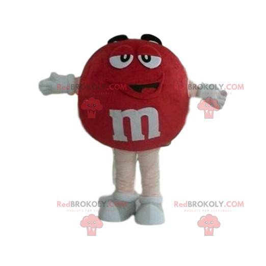 Mascota de M & M's roja muy sonriente - Redbrokoly.com