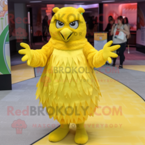 Lemon Yellow Hawk mascot costume character dressed with a Pleated Skirt and Mittens