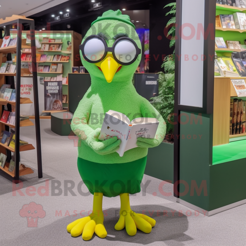 Lime Green Gull mascot costume character dressed with a Graphic Tee and Reading glasses Lime Green Gull mascot costume character dressed with a Graphic Tee and Reading glasses