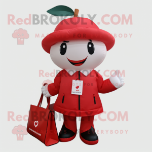 Red Cherry mascot costume character dressed with a Coat and Messenger bags