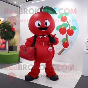 Red Cherry mascot costume character dressed with a Coat and Messenger bags