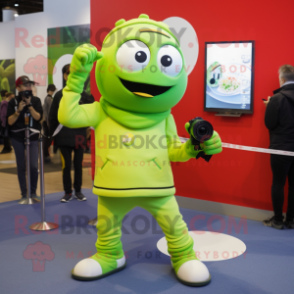 Lime Green Camera mascot costume character dressed with a Joggers and Berets