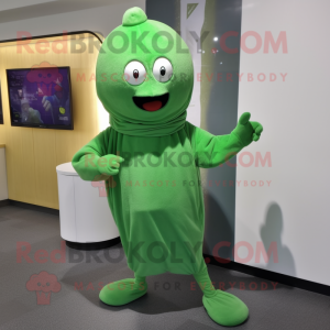 Green Plum mascot costume character dressed with a Joggers and Shawl pins