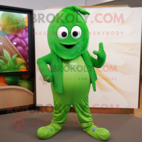 Green Plum mascot costume character dressed with a Joggers and Shawl pins