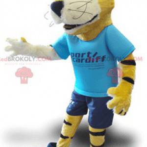 Geel zwart-witte tijger mascotte met een blauwe outfit -