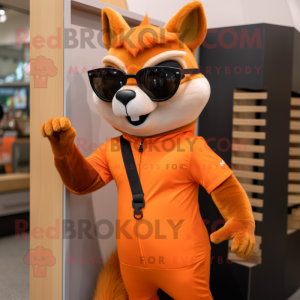 Orange Squirrel mascot costume character dressed with a Jeggings and Sunglasses