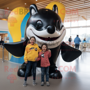 Gold Killer Whale mascot costume character dressed with a Mom Jeans and Keychains