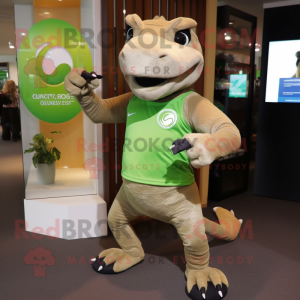 Olive Komodo Dragon mascot costume character dressed with a Running Shorts and Digital watches