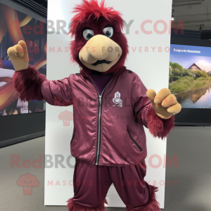 Maroon Ostrich mascot costume character dressed with a Windbreaker and Gloves