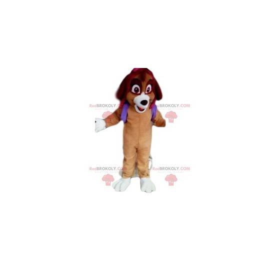 Mascote do cão com uma mochila roxa. Fantasia de cachorro -