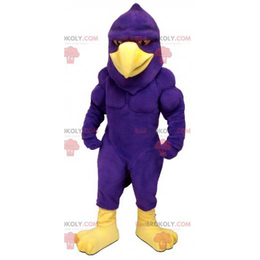 Very muscular purple and yellow bird eagle mascot -