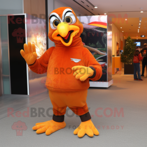 Orange Eagle mascot costume character dressed with a Sweater and Rings