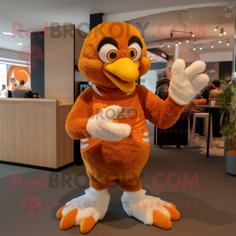 Orange Eagle mascot costume character dressed with a Sweater and Rings