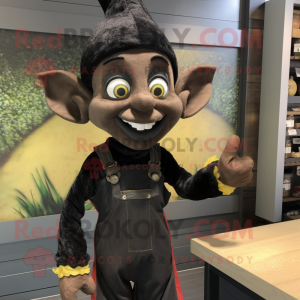 Black Elf mascot costume character dressed with a Dungarees and Wraps