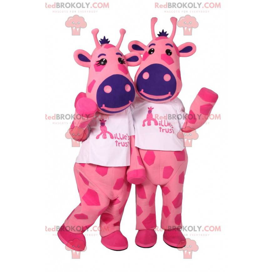 Mascotas de dos jirafas rosadas con manchas púrpuras -