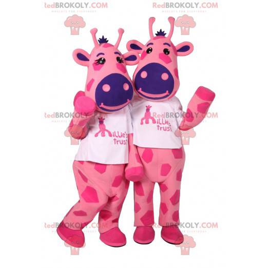 Maskottchen von zwei rosa Giraffen mit lila Flecken -