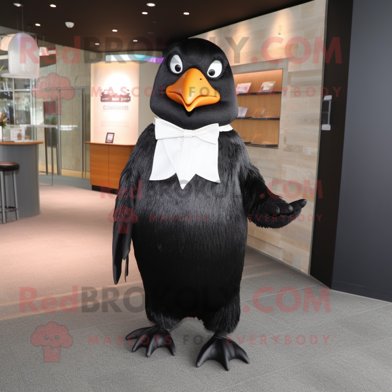 Black Penguin mascot costume character dressed with a Pleated Skirt and Tie pins Black Penguin mascot costume character dressed with a Pleated Skirt and Tie pins