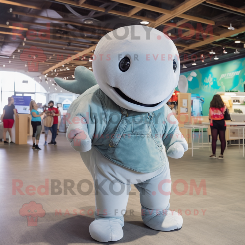 Gray Beluga Whale mascot costume character dressed with a Corduroy Pants and Necklaces