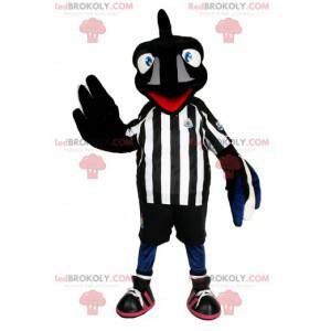 Mascota pájaro negro en traje de fútbol. Disfraz de pájaro