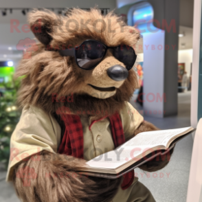 Brown Sloth Bear mascot costume character dressed with a Rash Guard and Reading glasses