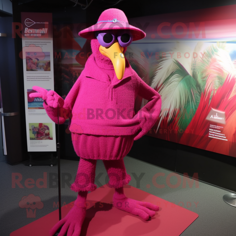 Magenta Flamingo mascot costume character dressed with a Cardigan and Hat pins