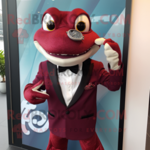 Maroon Geckos mascot costume character dressed with a Tuxedo and Digital watches