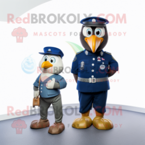 Navy Kiwi mascot costume character dressed with a Oxford Shirt and Watches