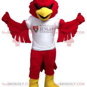 Mascotte uccello rosso e giallo con una maglietta bianca -