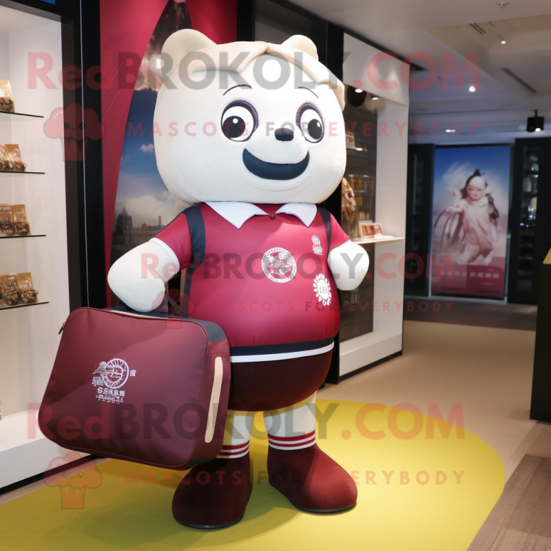 Maroon Dim Sum mascot costume character dressed with a Rugby Shirt and Tote bags Maroon Dim Sum mascot costume character dressed with a Rugby Shirt and Tote bags