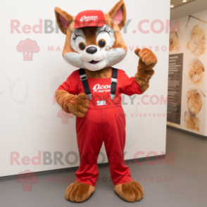 Red Bobcat mascot costume character dressed with a Dungarees and Digital watches