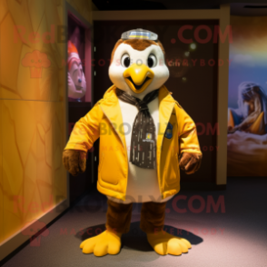 Gold Penguin mascot costume character dressed with a Windbreaker and Cufflinks