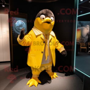 Gold Penguin mascot costume character dressed with a Windbreaker and Cufflinks